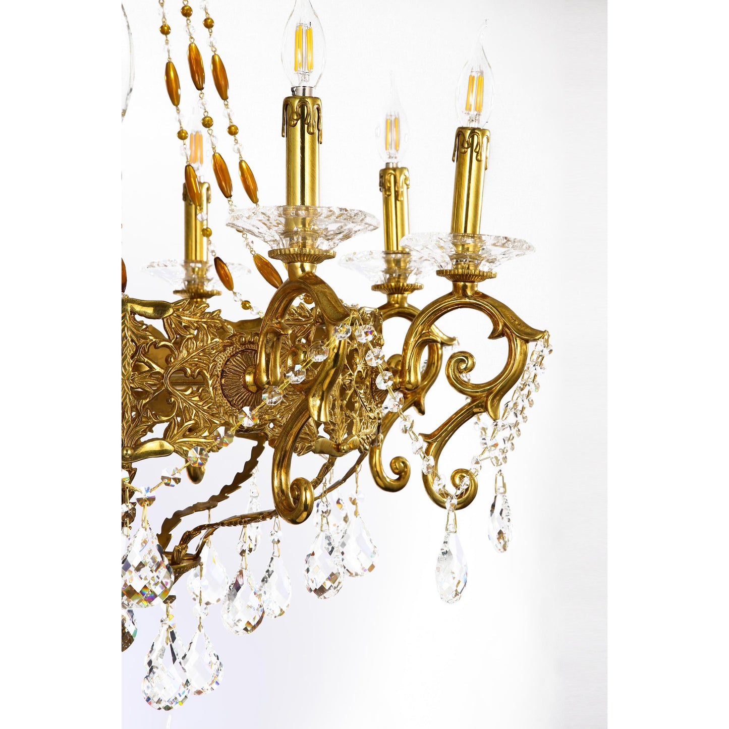 Eight Arm Chandelier with Large Crystal Prisms And Intricate Brass Patterns