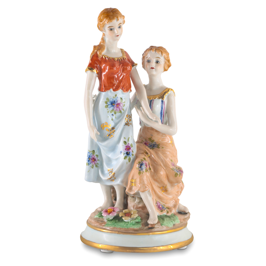 Figura de Porcelana Hermanas